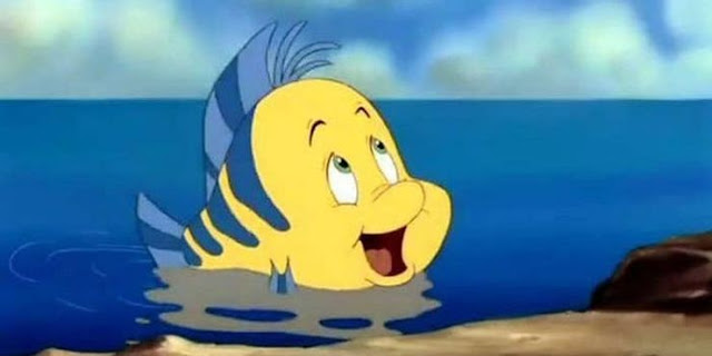 Personnage la petite sirene polochon le poisson jaune