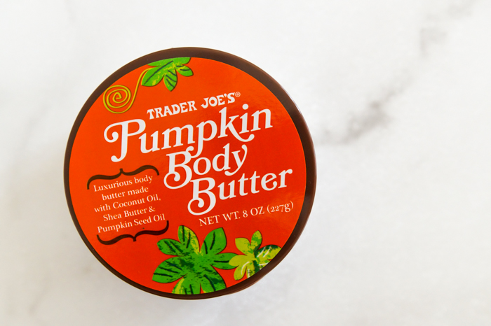 Trader Joe's pumpkin body butter tub on marble surface