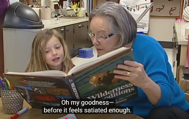 A person and a child reading a book

AI-generated content may be incorrect.