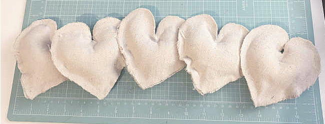 row of cotton hearts