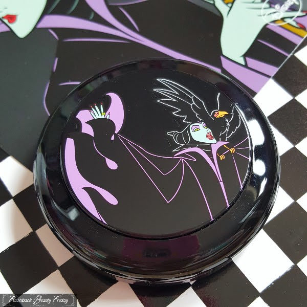 closed black glossy compact with Disney Maleficent image in centre