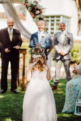 flower girl walking down aisle