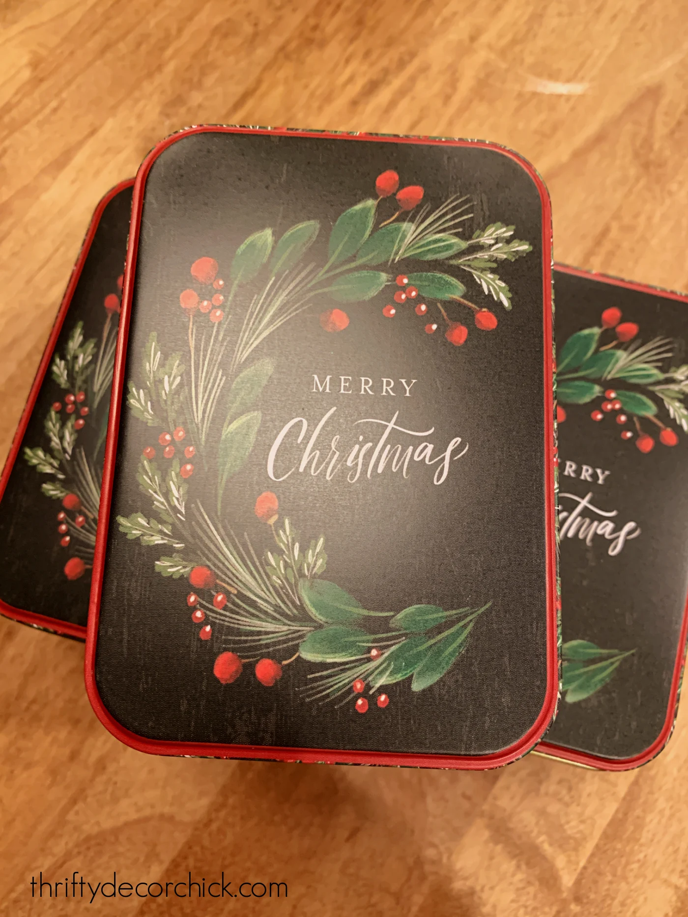black green Christmas gift tins