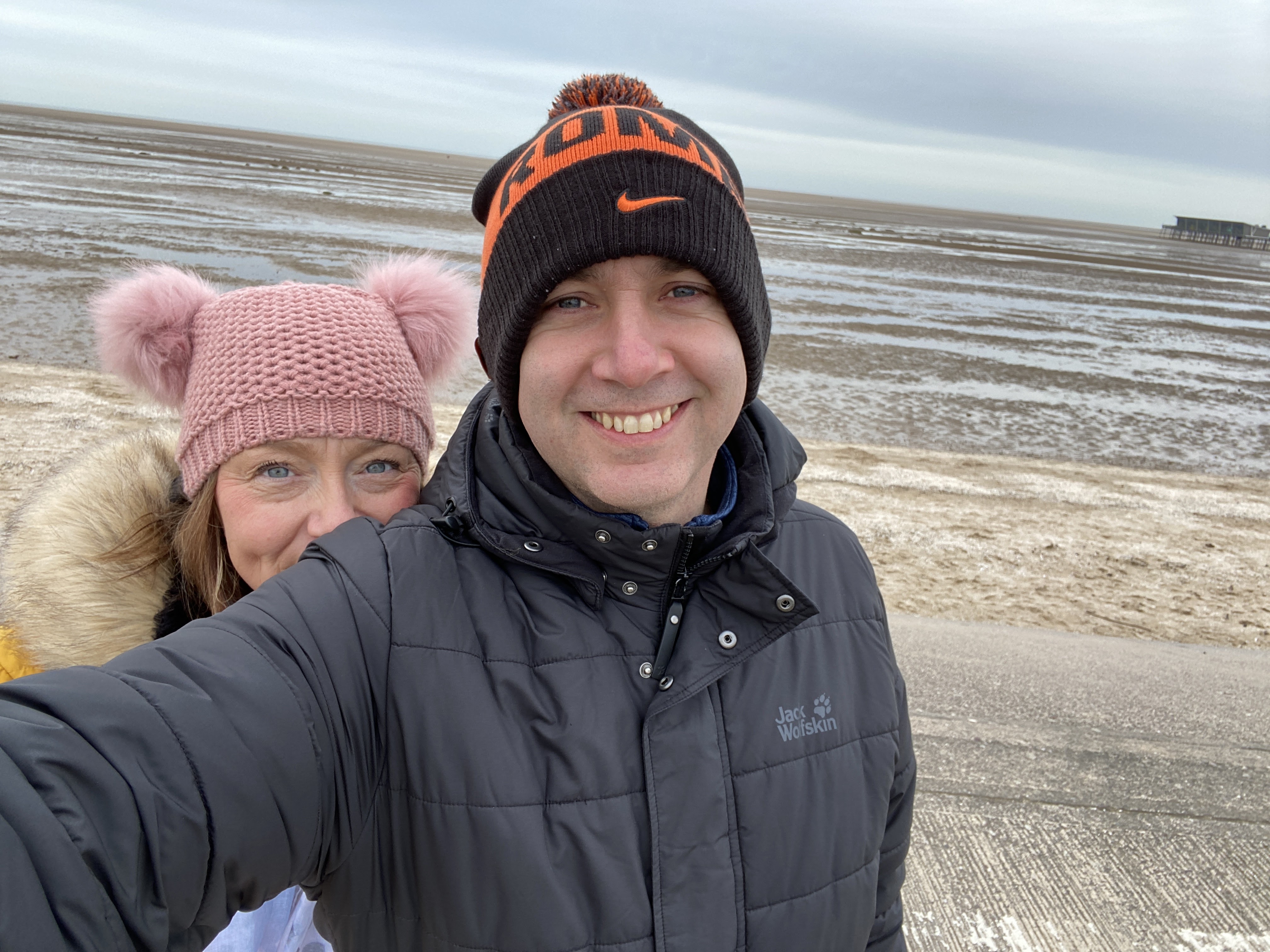 man and women at the seaside