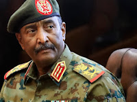Sudan’s military takes power and arrests the prime minister.