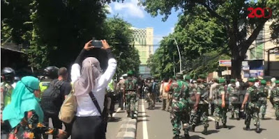 Dalam massa reuni 212 dibandingkan aksi dengan demo buruh