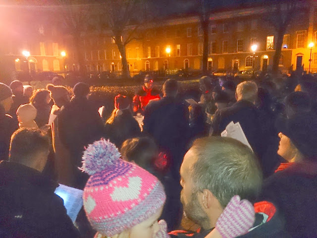 MEOTRA residents singing carols in Tredegar Square