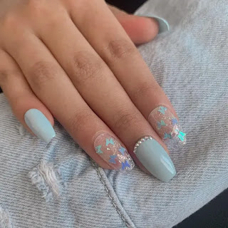 Baby blue nails with butterflies