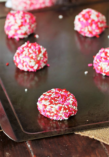 Valentine's Sprinkle-Coated Sugar Cookies Ready to Bake Image