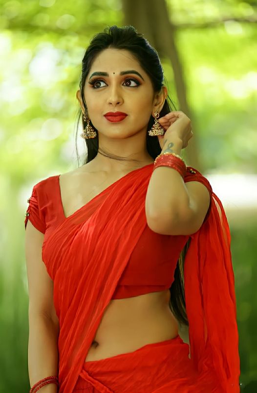 Actress Nisarga Lakshman Gowda Hot Navel Photos In Red Saree