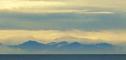 Grainy sunset from Raumati beach, wet weather over the South Island