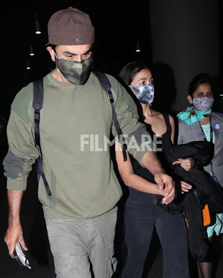 Ranbir & Alia Bhatt were spotted at the airport as they returned from their New Year vacation