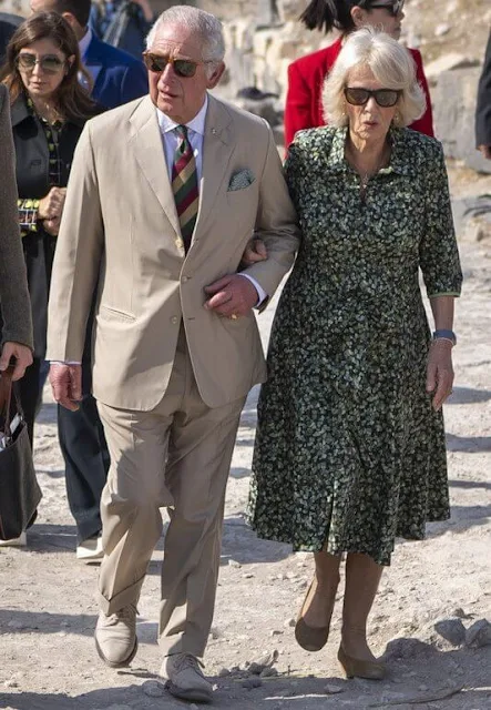 The Duchess wore a green and black Ceropegia Merilis printed shirt dress. Van Cleef and Arpels bracelet