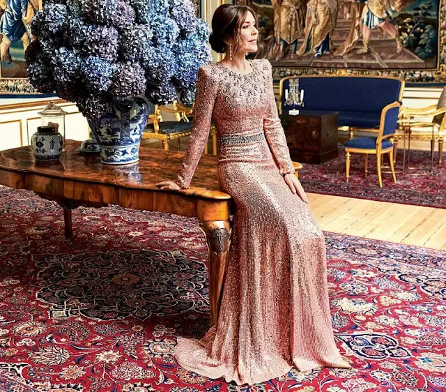 Crown Princess Mary wore a new clove velvet suit by Temperley London, and a georgia sequined pink gown by Jenny Packham