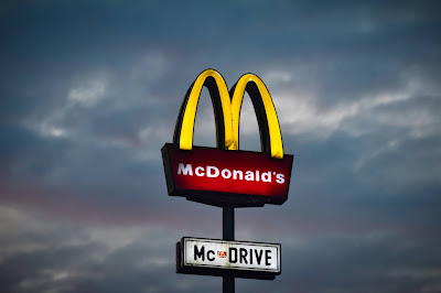 McDonald's sign (Credit: Jurij Kenda/Unsplash)