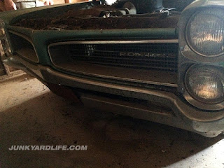 Grill on 1966 Pontiac Tempest pulled from garage after 28 years.