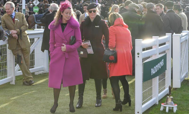 Zara Tindall wore a faux-fur collar wine red wool coat from Hobbs. Caroline Svedbom Electra pearl crystal gold earrings