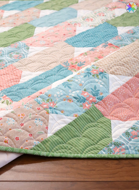 Top Notch quilt pattern by Andy Knowlton of A Bright Corner a layer cake pattern in four sizes