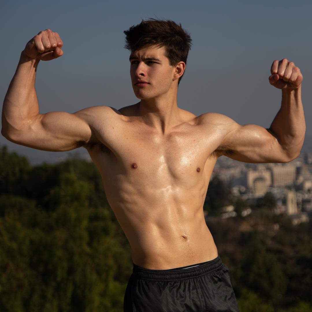 straight-hot-shirtless-cocky-young-guy-flexing-biceps