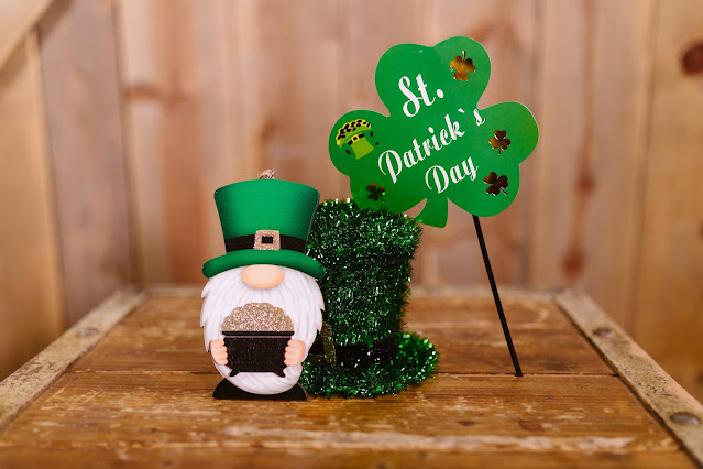 St. Patrick's Day Themed Background with Leprechaun  Hat and Shamrock Sign