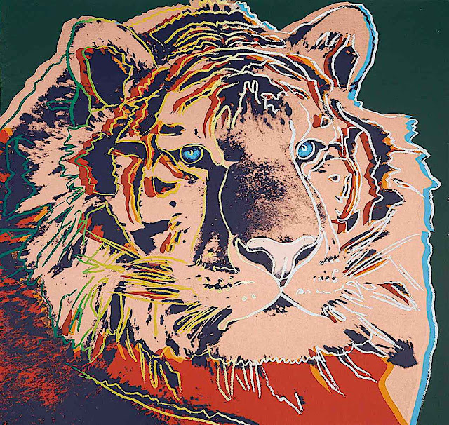 an Andy Warhol 1983 print of a tiger head