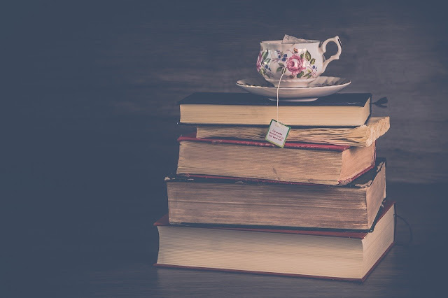 book stack and cup of tea