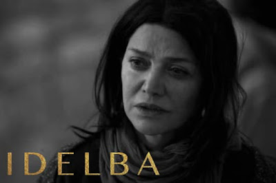 Black and white photo of Shohreh Aghdashloo with the caption Idelba in Gold