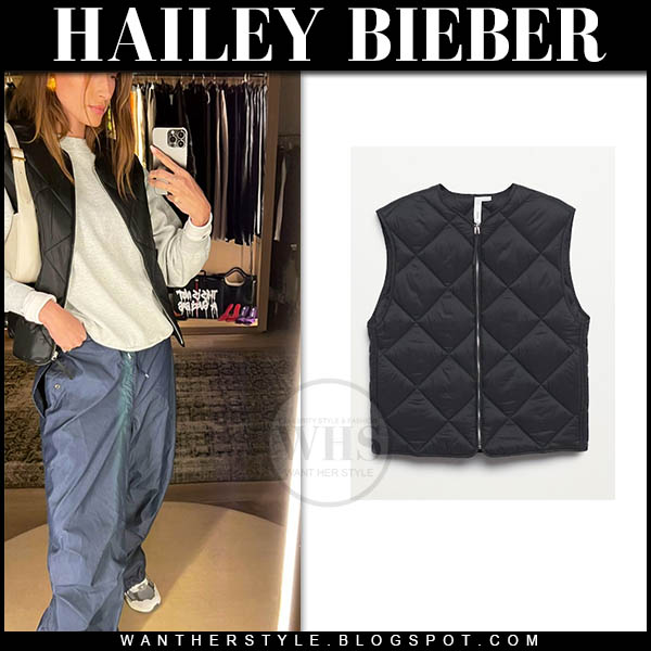 Hailey Bieber in black vest and black nylon pants