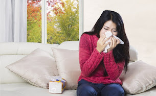 Woman Blocking Nose