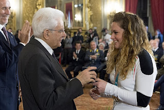 Michela Moiola receives an honour from Italy president Sergio Mattarella after her 2018 win