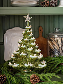 A tabletop plug-in ceramic Christmas tree.