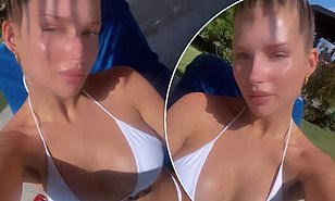 Lottie Greenery shows her cleavage in a scanty white two-piece during Antigua escape... after her tactless