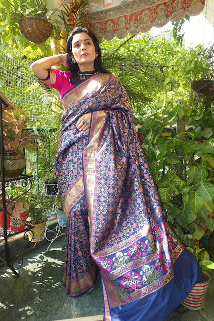 Blue Banarasi silk saree. With Patola like Navratan body and Paithani like border and pallu