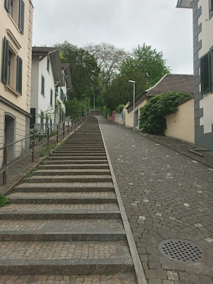 Gradual inclined staircase up the hill to Zurich University.