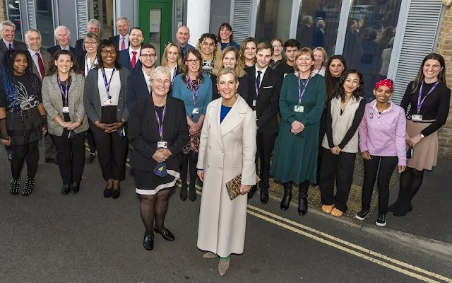 The Countess of Wessex wore a custodi double-breasted brushed wool coat from Max Mara. The Countess met with staff at Aldershot Foyer