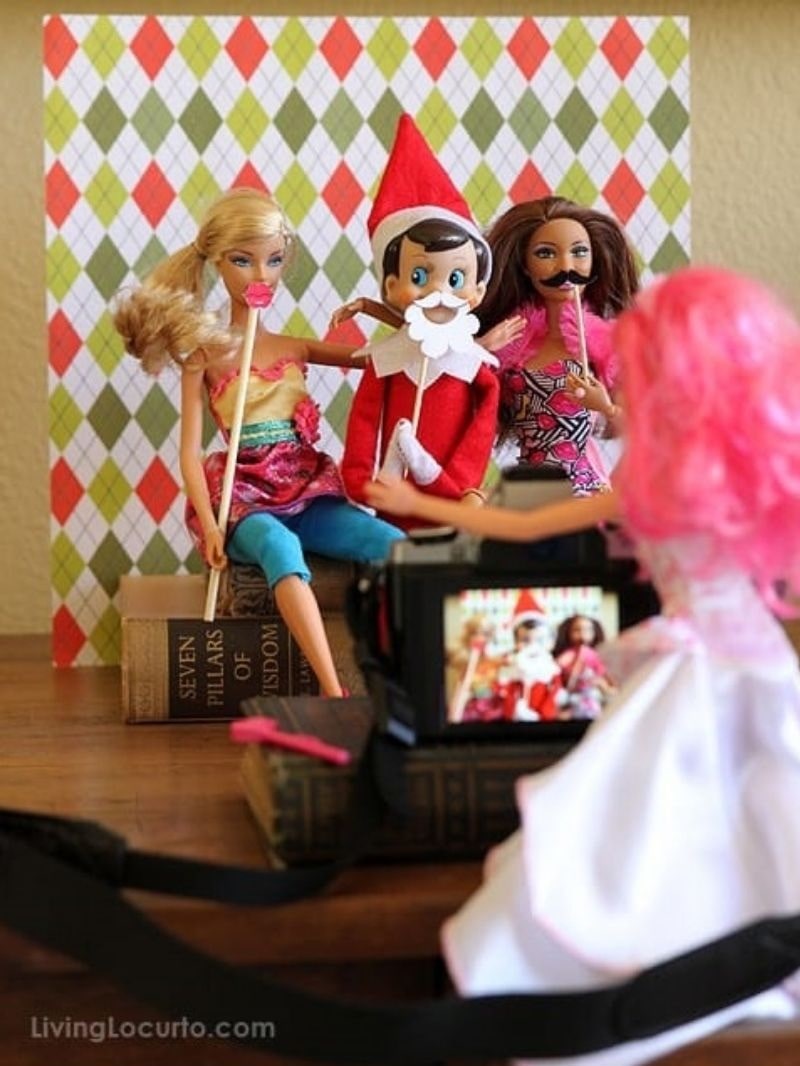 elf and barbie party with photo props