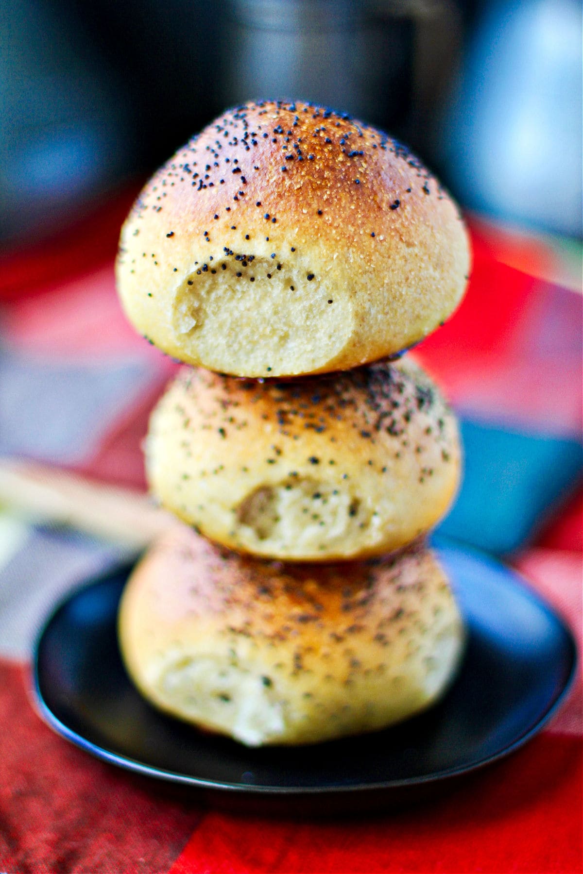 Make-ahead dinner rolls stacked on a plate.