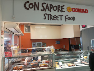 " Conad City supermarket " on Viale Amerigo Vespucci in Rimini  serving takeaway  street food.