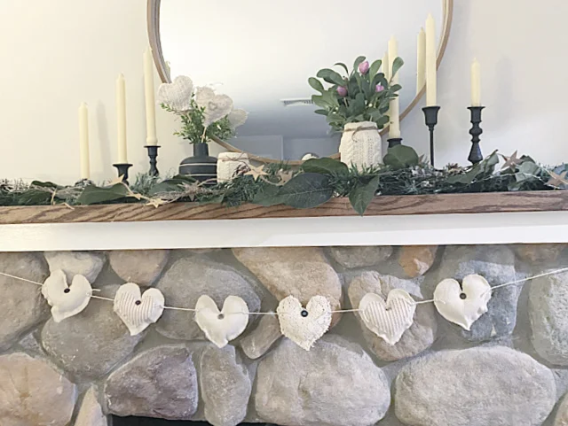 heart garland on the mantel