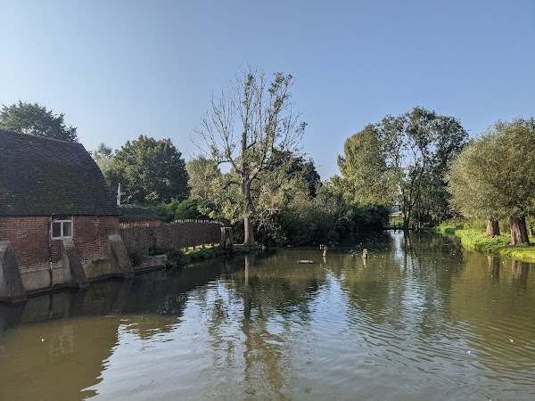 Mill building and pond next to the River Stour