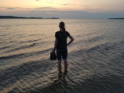 Hiker Cape Breton on Trans Canada Trail sunset.