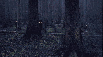 A dark forest with sneaky dark ghost hiding and moving around trees