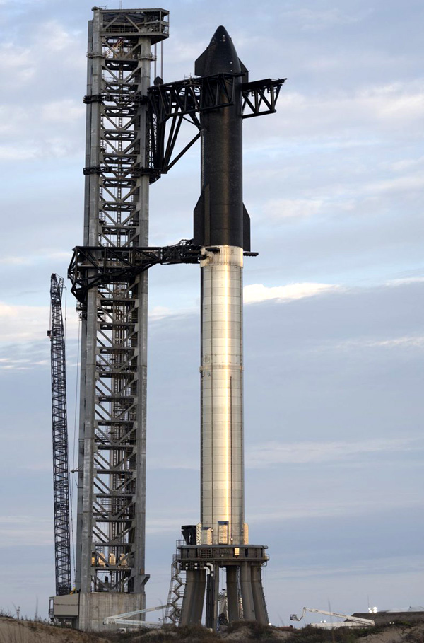 SpaceX's Starship Super Heavy rocket stands tall at the pad in Starbase, Texas...on February 10, 2022.