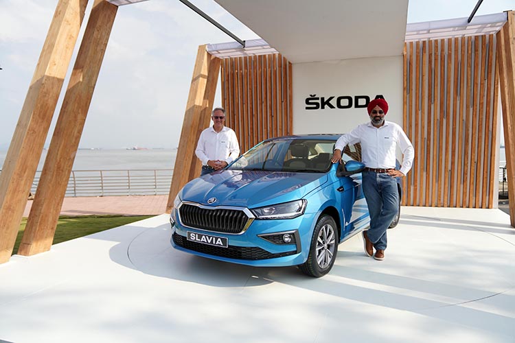 Gurpratap Boparai, Managing Director of ŠKODA AUTO Volkswagen India Private Limited and Zac Hollis, Brand Director, ŠKODA AUTO India unveiling the new Škoda Slavia in Mumbai