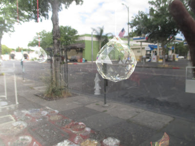 Crystal in the store window on Main Street in Chico. Natural Food Store Reflection.