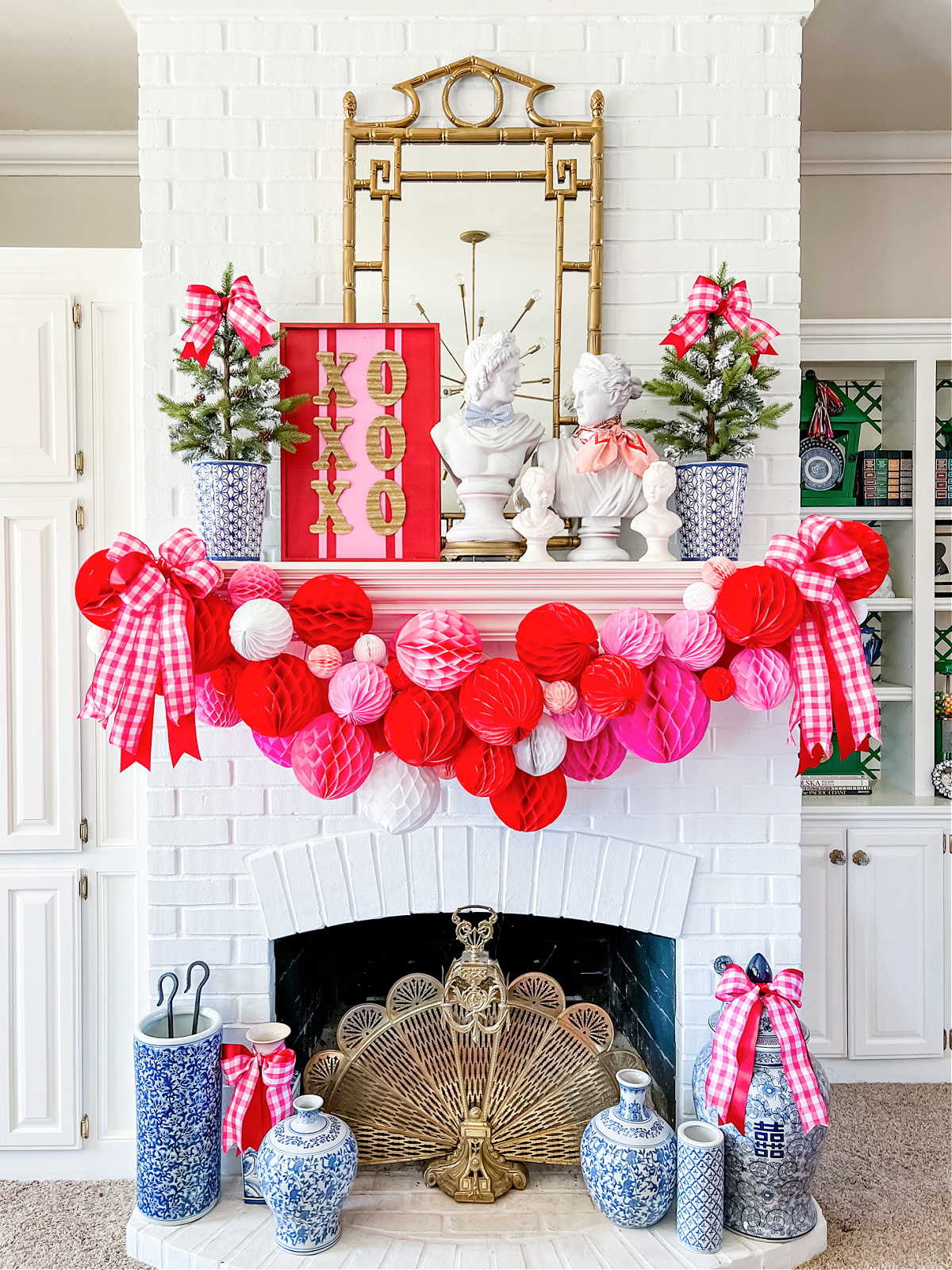 Honeycomb Ball Garland on Mantel with Valentine's Day Decorations