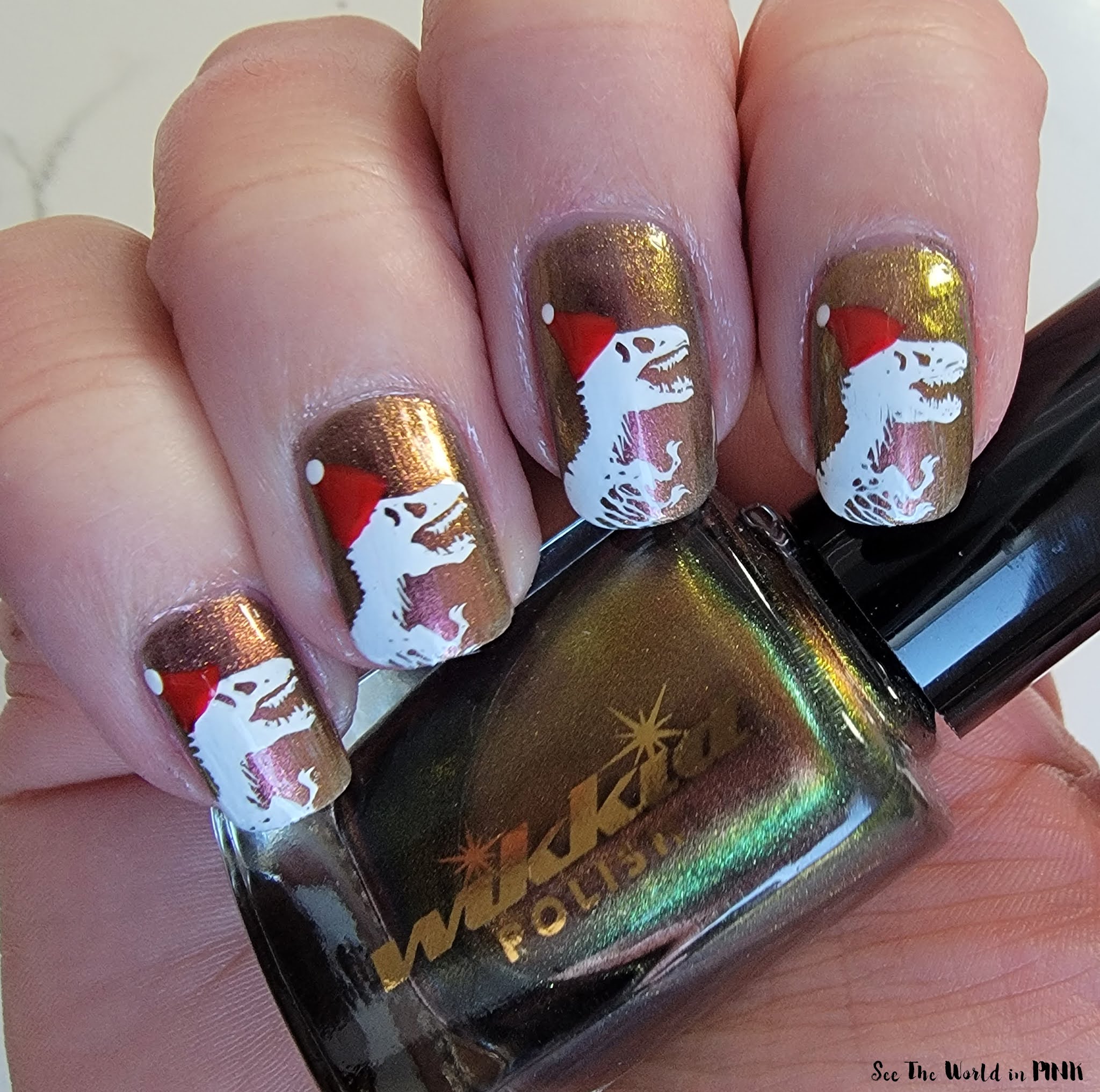 Manicure Monday - Dinosaur Santa Nails