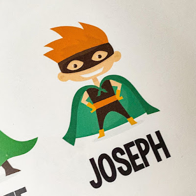 Cartoon character of a little boy superhero with the name Joseph underneath it