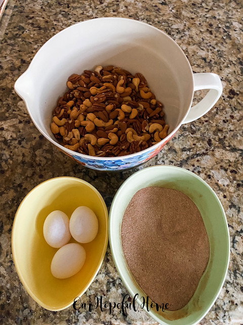 three mixing bowls eggs nuts sugar cinnamon