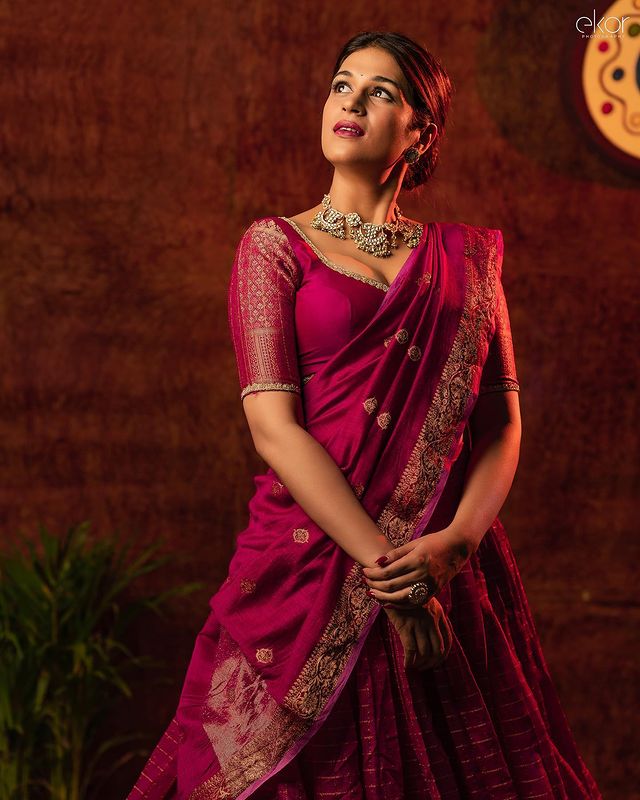 Ethereal Elegance: Shraddha Das' Magenta Half Saree Magic